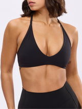 Thumbnail 3 of Girlfriend Reversible Sports Bra - Onyx Black and White, 3 of 11